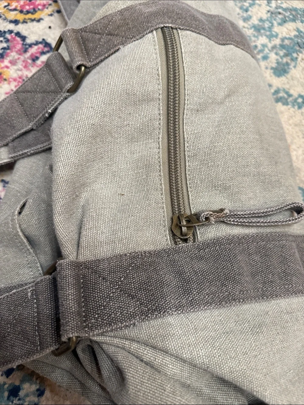 Gray canvas duffle bag